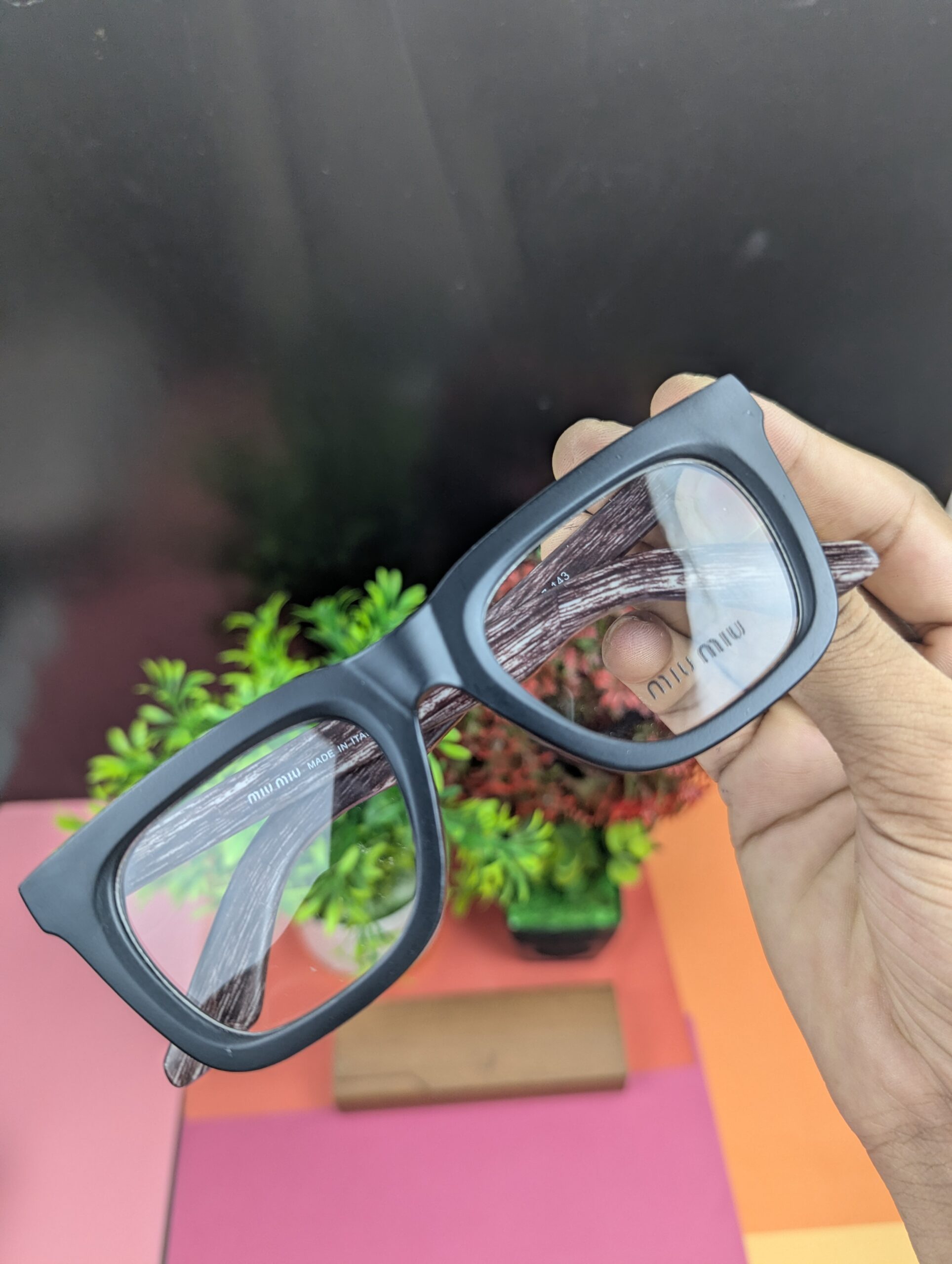 Miu Miu Stylish Square Optical Eyeglasses – Matte Black & Wood Grain Finish - Image 2