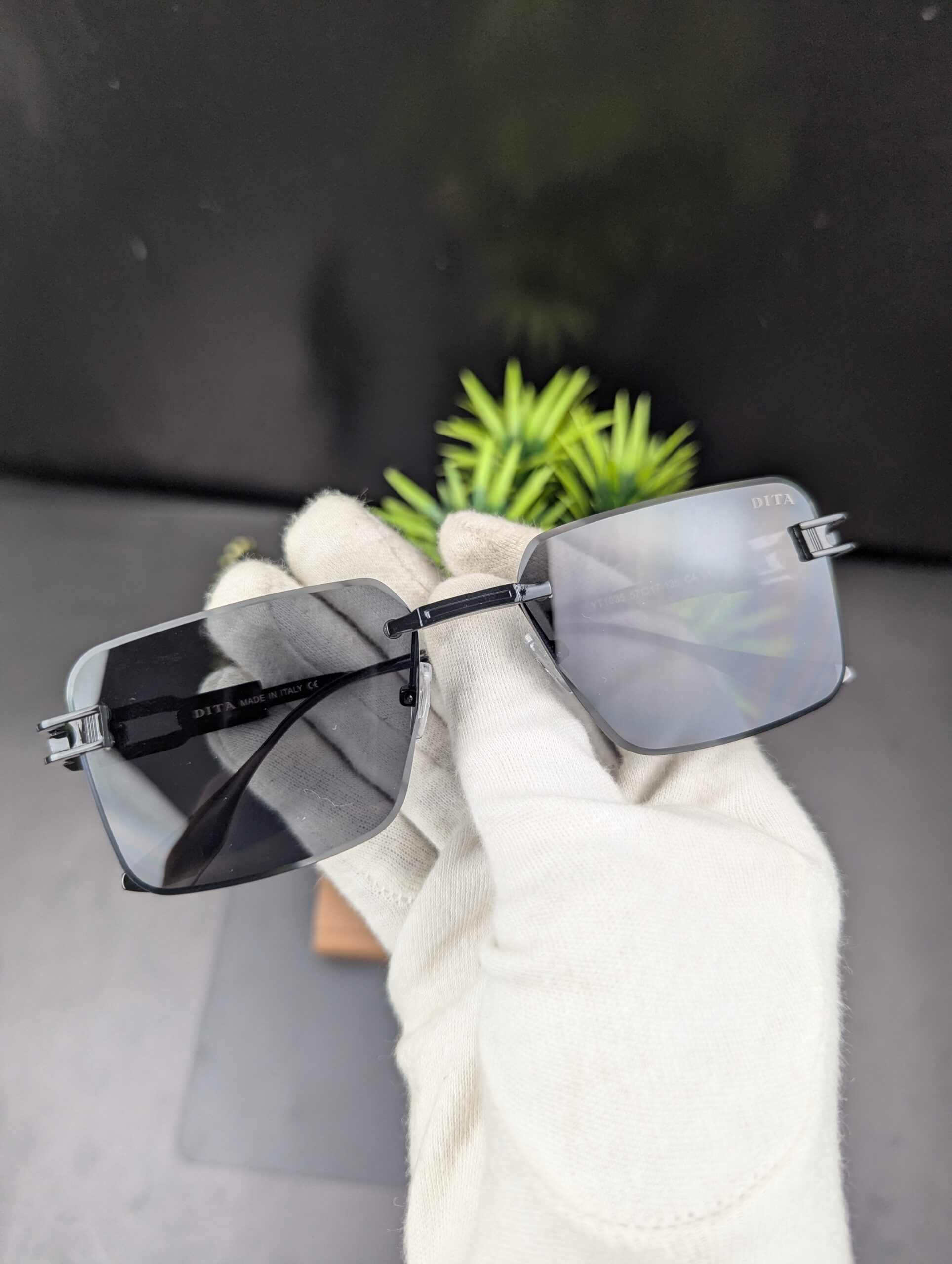 Modern All-Black Rimless Rectangular Sunglasses – Matte Black Metal Temples with Dark Tint Lenses