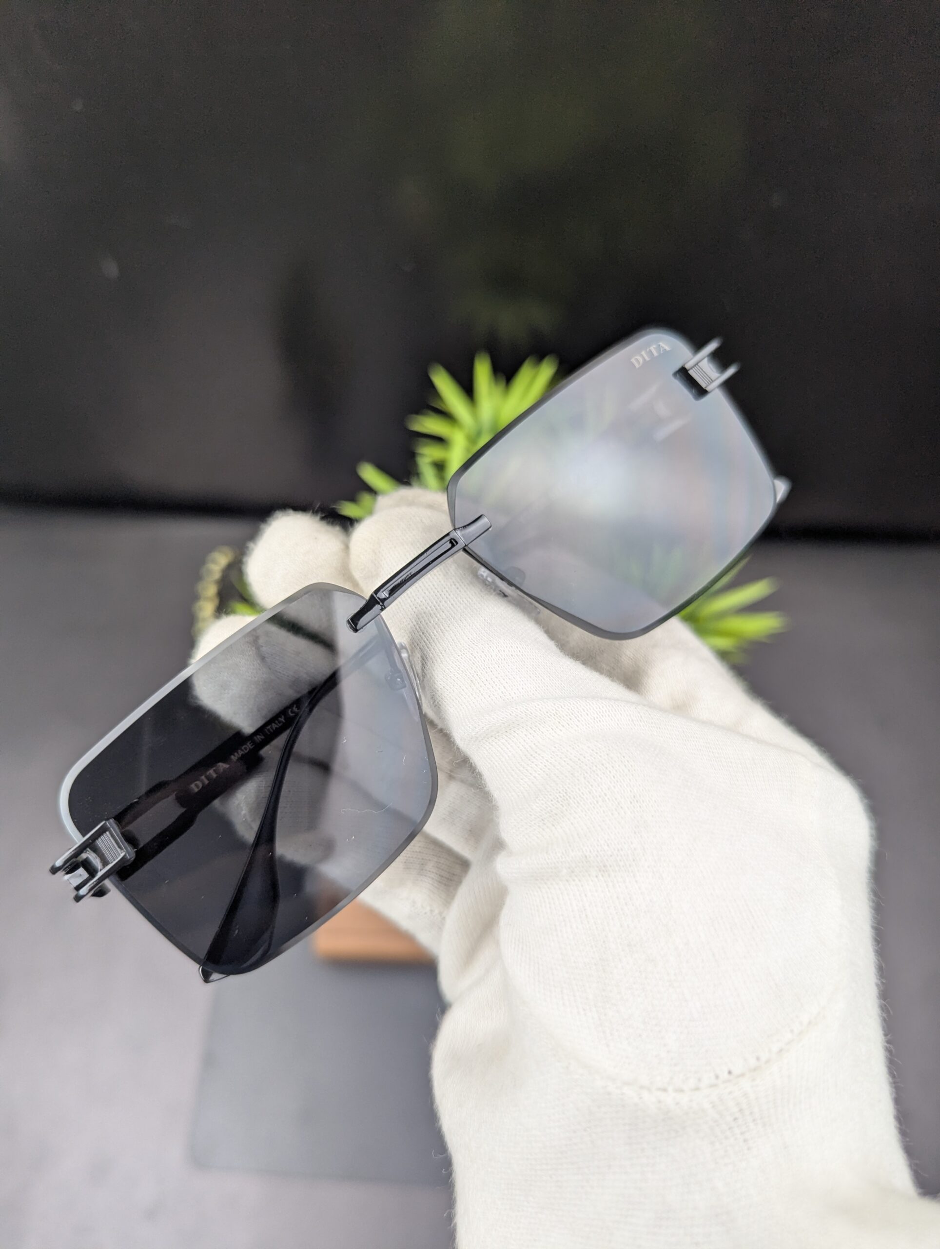 Modern All-Black Rimless Rectangular Sunglasses – Matte Black Metal Temples with Dark Tint Lenses - Image 4